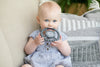 Be Kind to All Kinds Happy Teether by Bella Tunno being used by a  baby