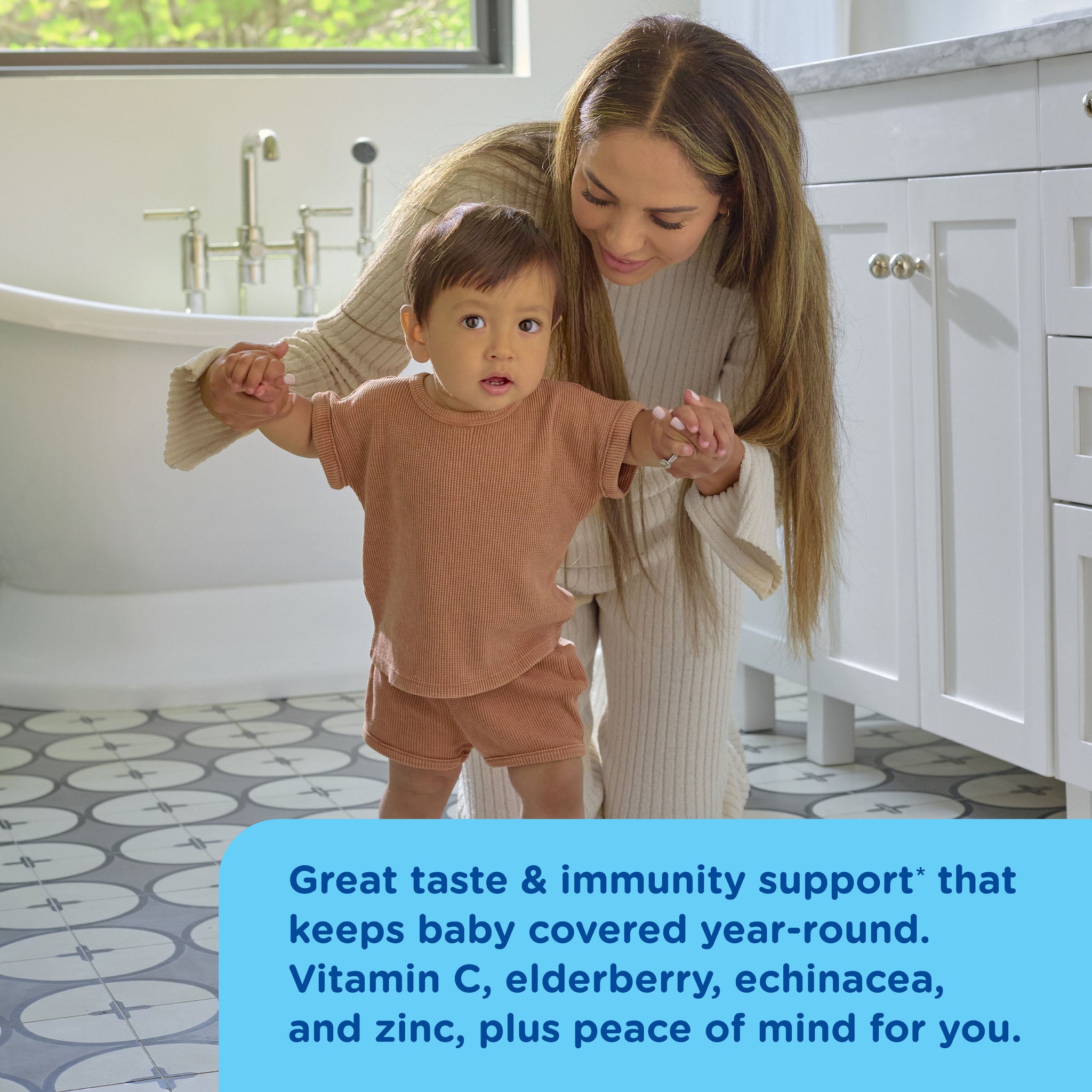 Mommy's Bliss Organic Baby Immunity Drops with Elderberry shown in an everyday lifestyle photograph