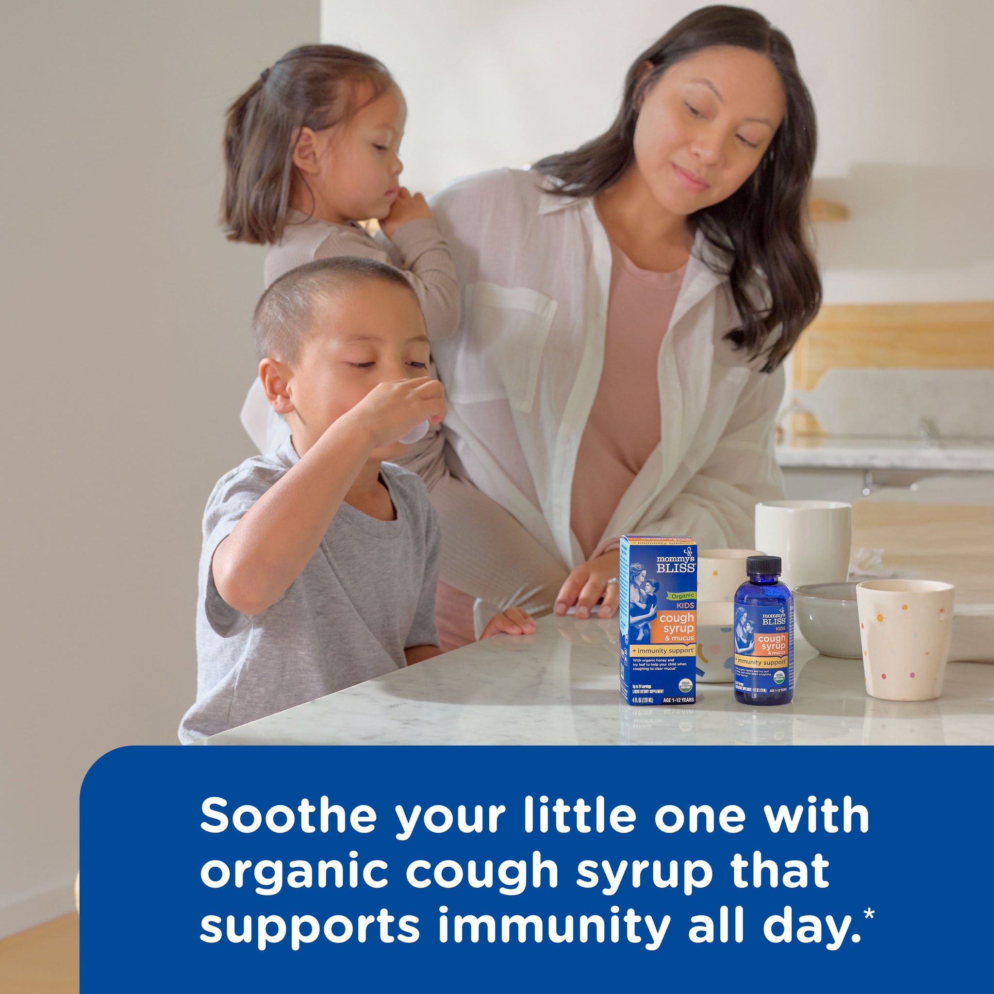 Mommy's Bliss Organic Kids Cough Syrup and Mucus shown in an everyday lifestyle photograph