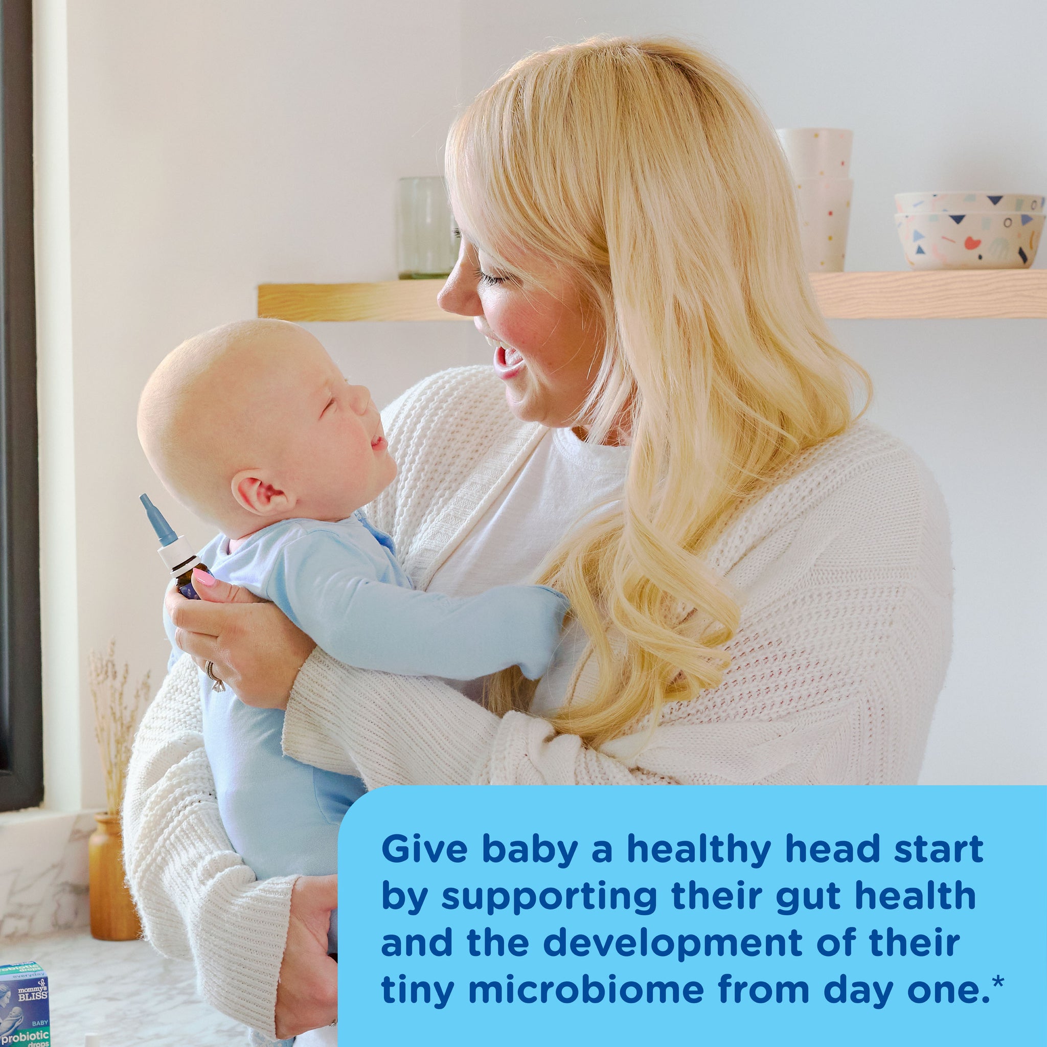 Mommy's Bliss Baby Probiotic Drops plus Vitamin D shown in an everyday lifestyle photograph