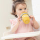 Hello Sunshine Happy Sippy Cup by Bella Tunno being used by a toddler