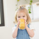 Hello Sunshine Happy Sippy Cup by Bella Tunno being used by a happy kid
